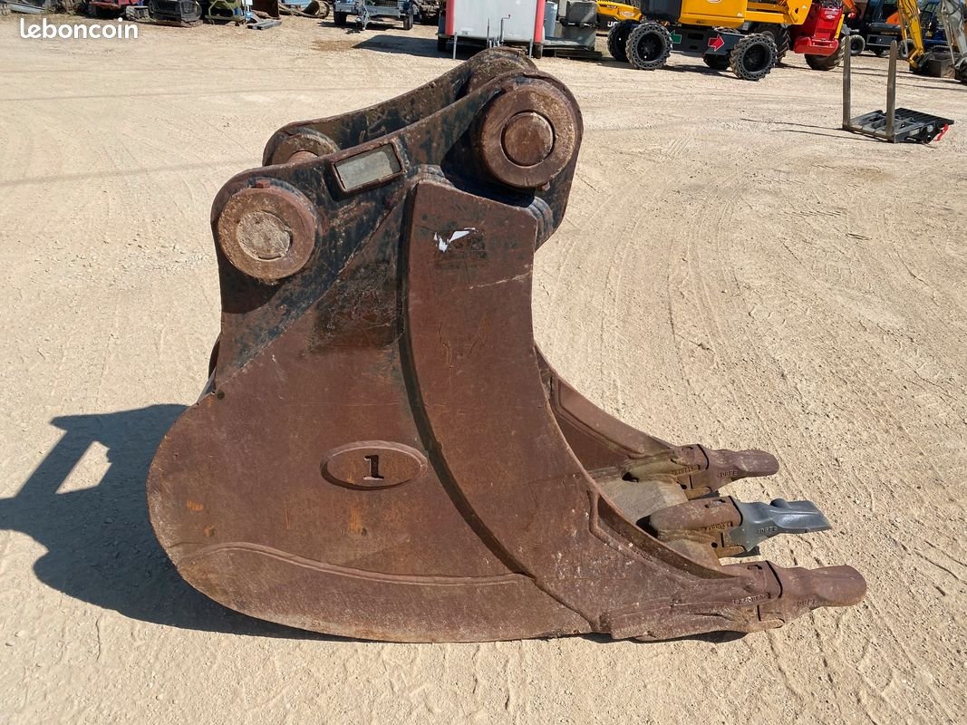 Godet de terrassement à axes