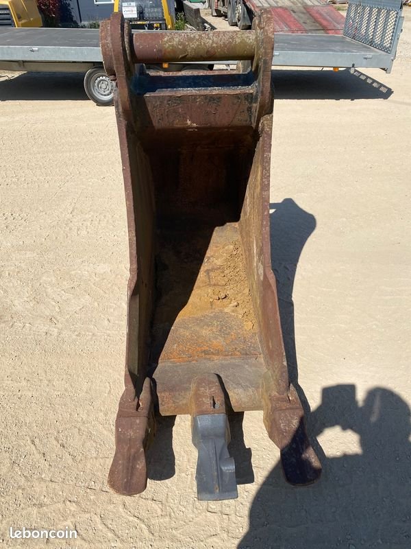 Godet de terrassement à axes