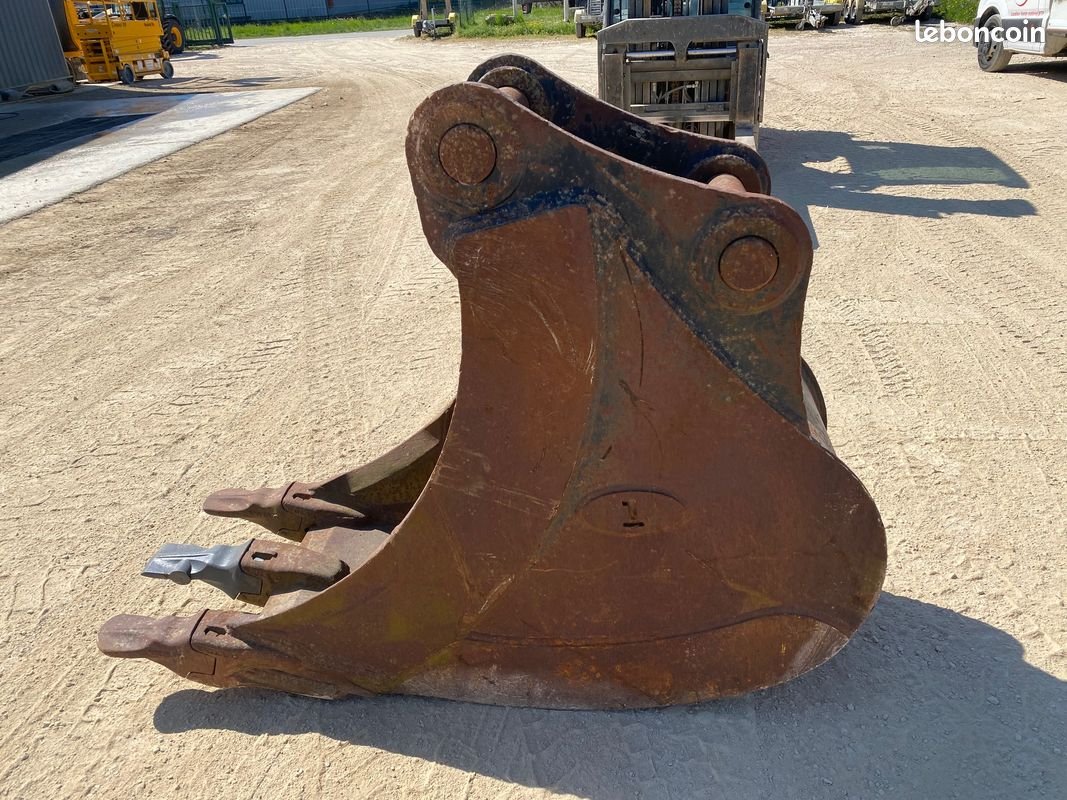 Godet de terrassement à axes